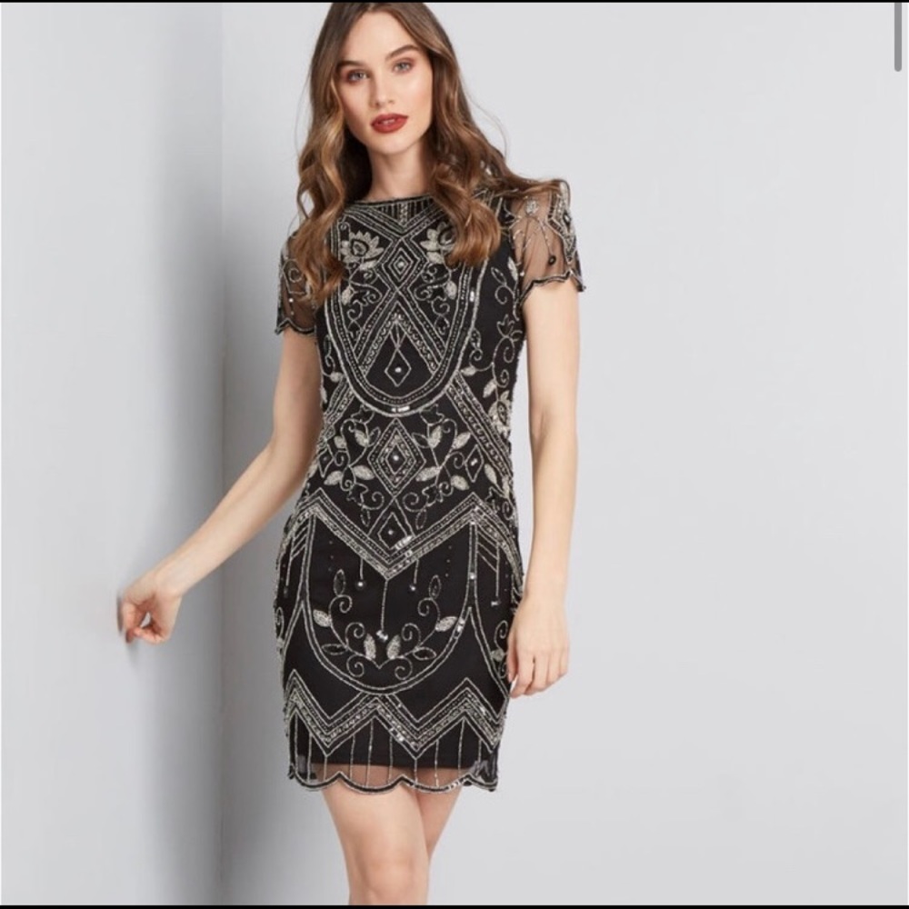 Beautiful beaded dress. Only worn once and in excellent condition.